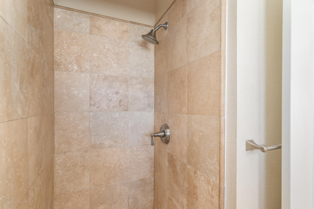 45546 3rd Street East Lancaster, CA 93535 - Photo 14 of 23 a bathroom with a shower