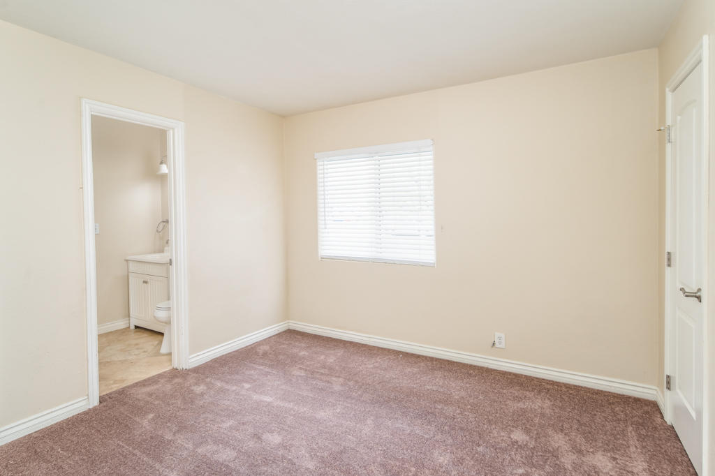 45546 3rd Street East Lancaster, CA 93535 - Photo 15 of 23 an empty room with a bathroom