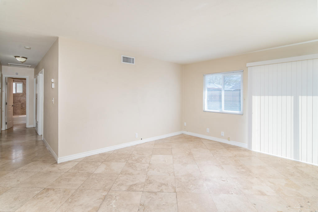 45546 3rd Street East Lancaster, CA 93535 - Photo 5 of 23 an empty room with windows
