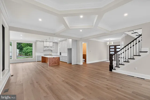 a view of kitchen with cabinets and wooden floor