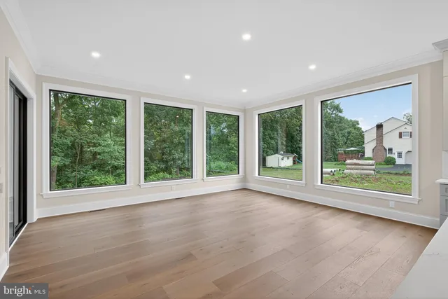 a kitchen with granite countertop a stove and a sink