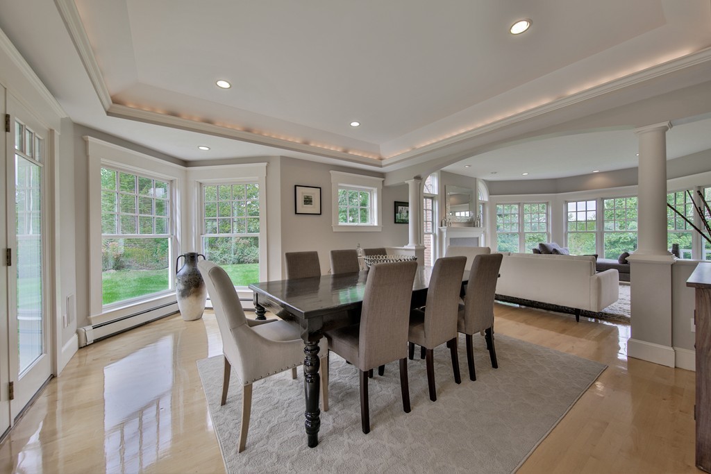 44 Walker Road Manchester, MA 01944 - Photo 13 of 30 a view of a dining room with furniture and a potted plant