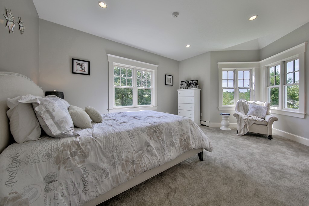 44 Walker Road Manchester, MA 01944 - Photo 24 of 30 a bedroom with a bed and a couch