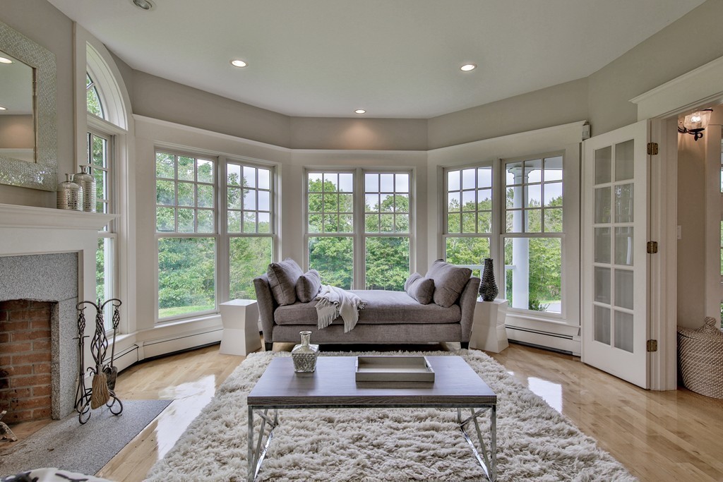 44 Walker Road Manchester, MA 01944 - Photo 4 of 30 a living room with furniture and a fireplace