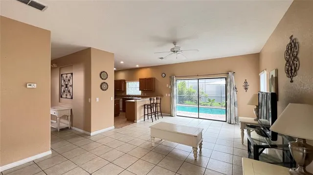 a living room with a couch and a flat screen tv
