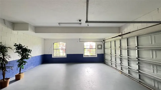 a view of a garage with stairs