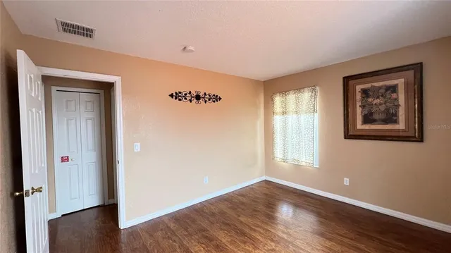 a bathroom with a tub a sink and a shower