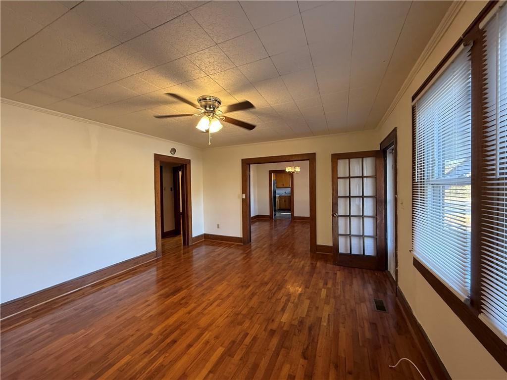 3329 Alabama Highway Rome, GA 30165 - Photo 11 of 32 a view of an empty room with wooden floor and a window