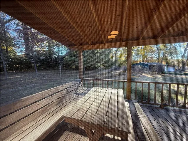 a view of balcony with wooden floor