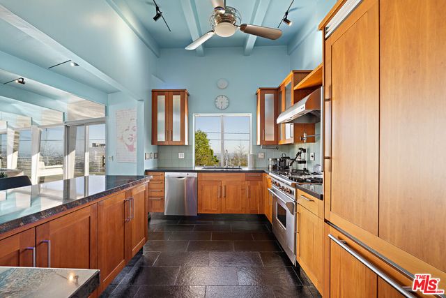 a view of a room with wooden walls