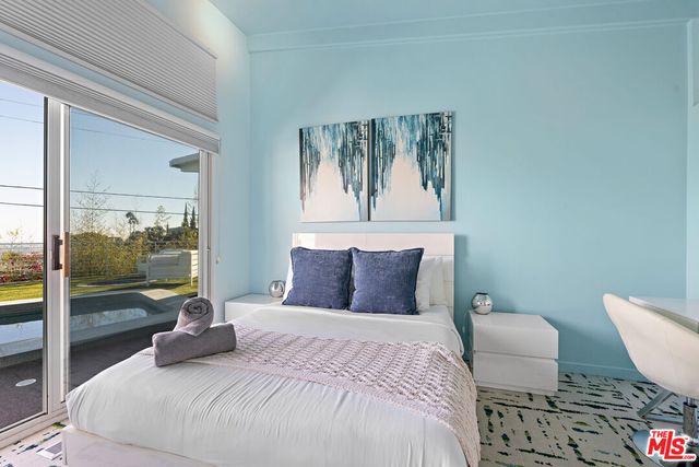 a spacious bathroom with a tub and shower