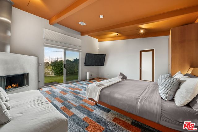 a living room with large windows