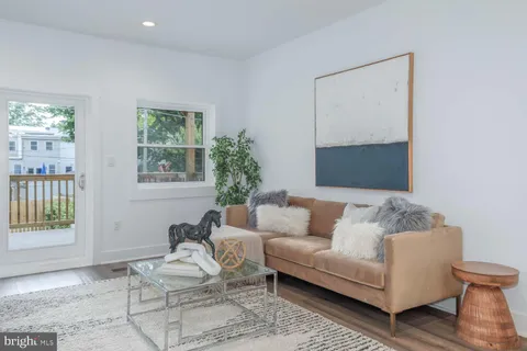 a living room with furniture and window