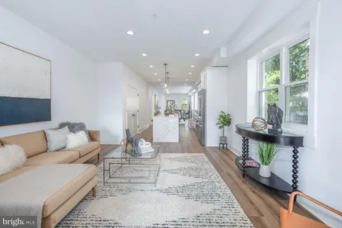 a balcony with furniture and a swing