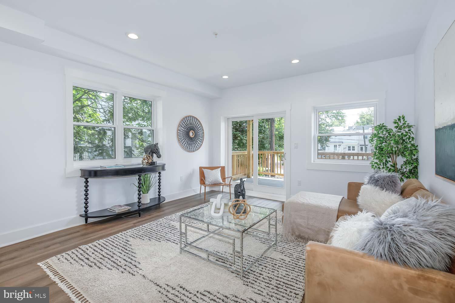 424 Taylor Street Northwest, Unit 1 Washington, DC 20011 - Photo 23 of 53 a living room with furniture and window