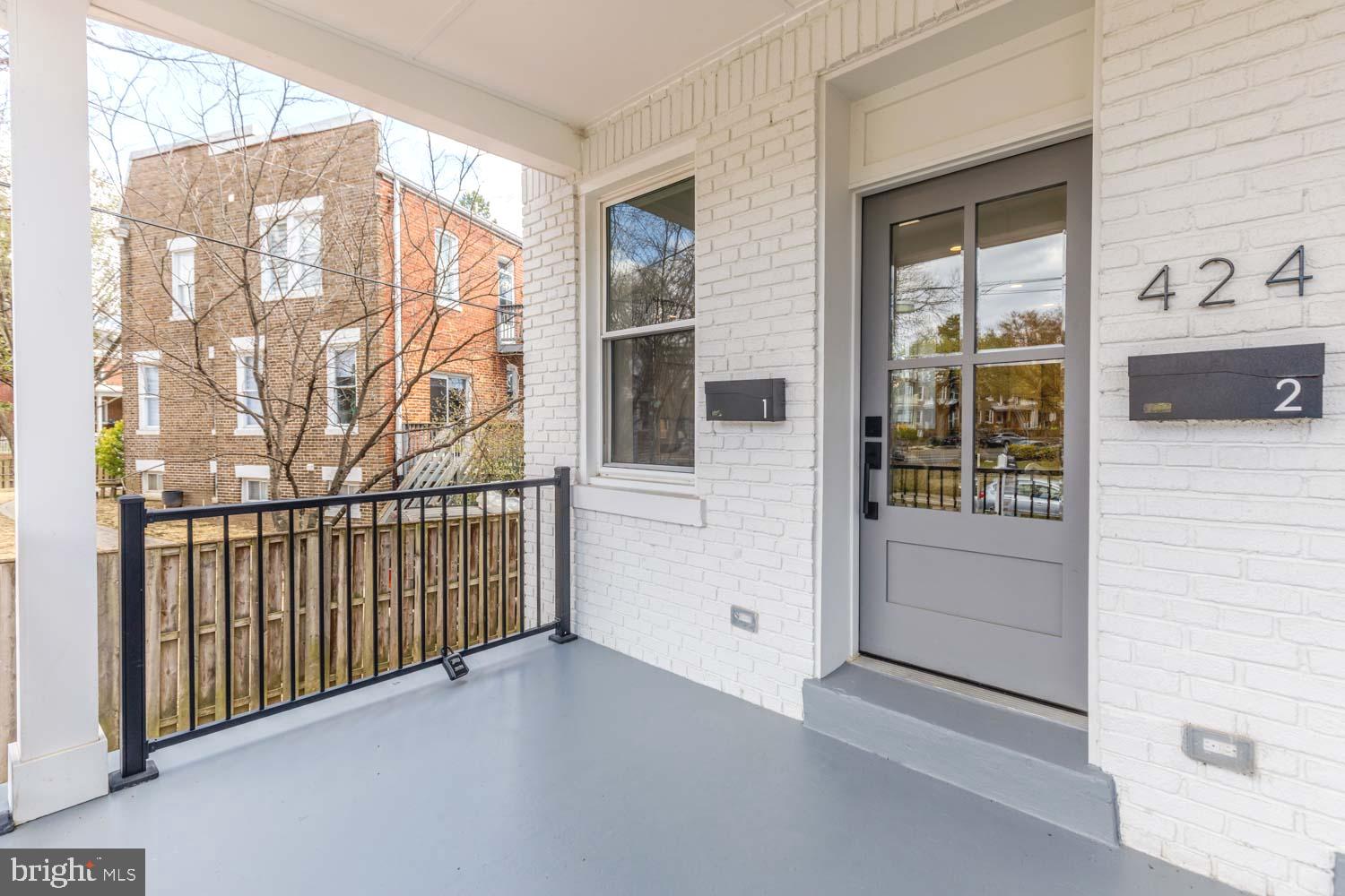 424 Taylor Street Northwest, Unit 1 Washington, DC 20011 - Photo 3 of 53 a view of a balcony with an outdoor space