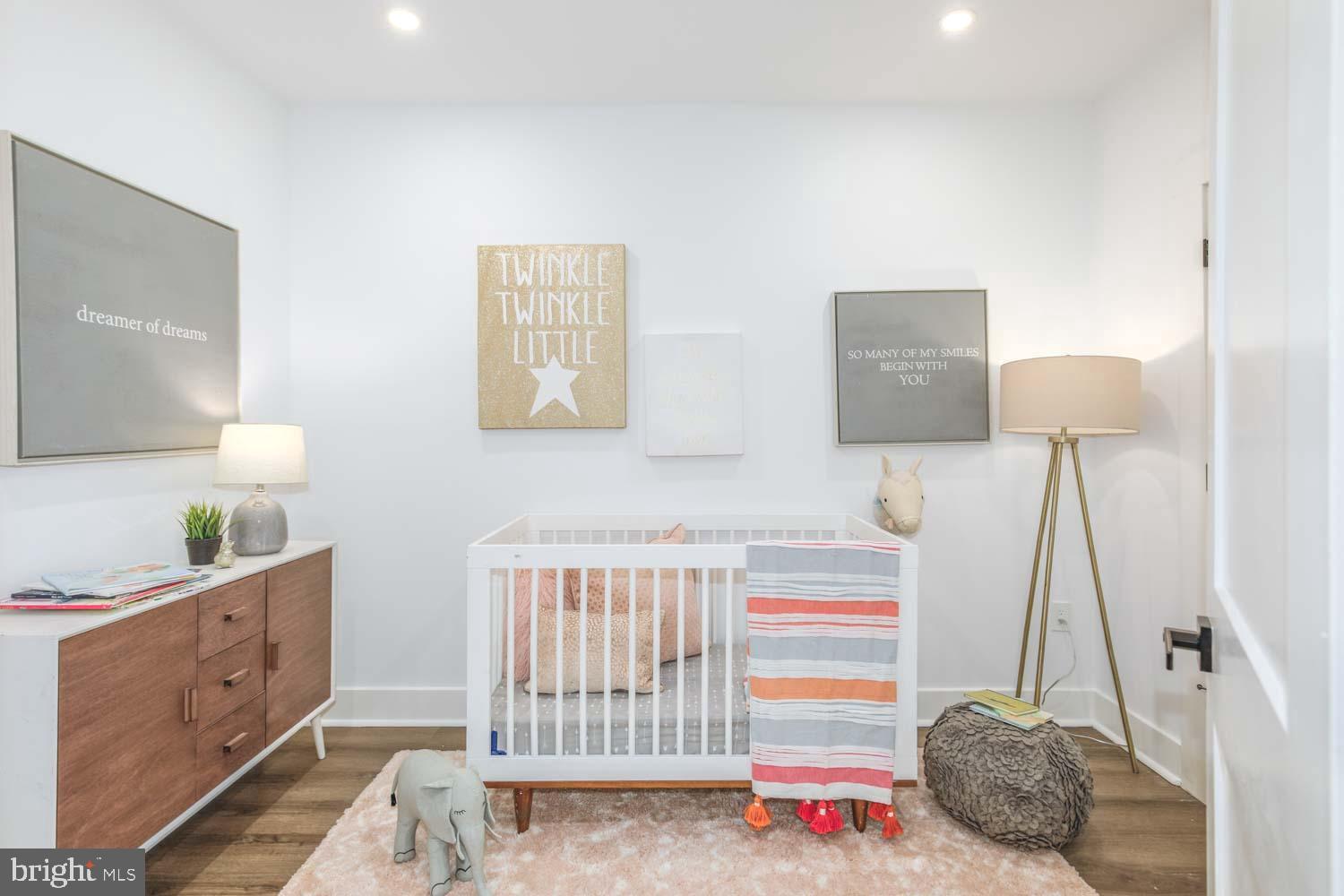 424 Taylor Street Northwest, Unit 1 Washington, DC 20011 - Photo 47 of 53 a bathroom with a sink and a mirror
