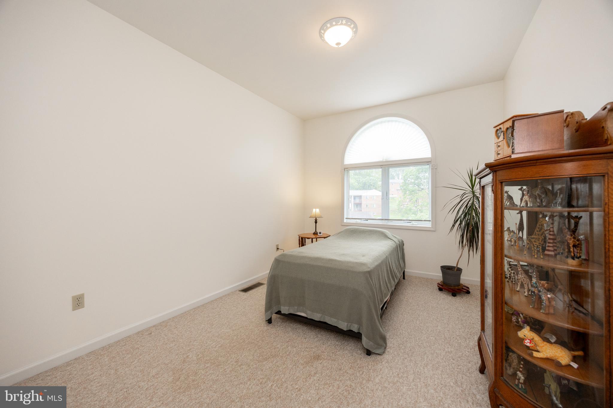 237 Poplar Street Spring City, PA 19475 - Photo 23 of 36 a room with a bed and a window
