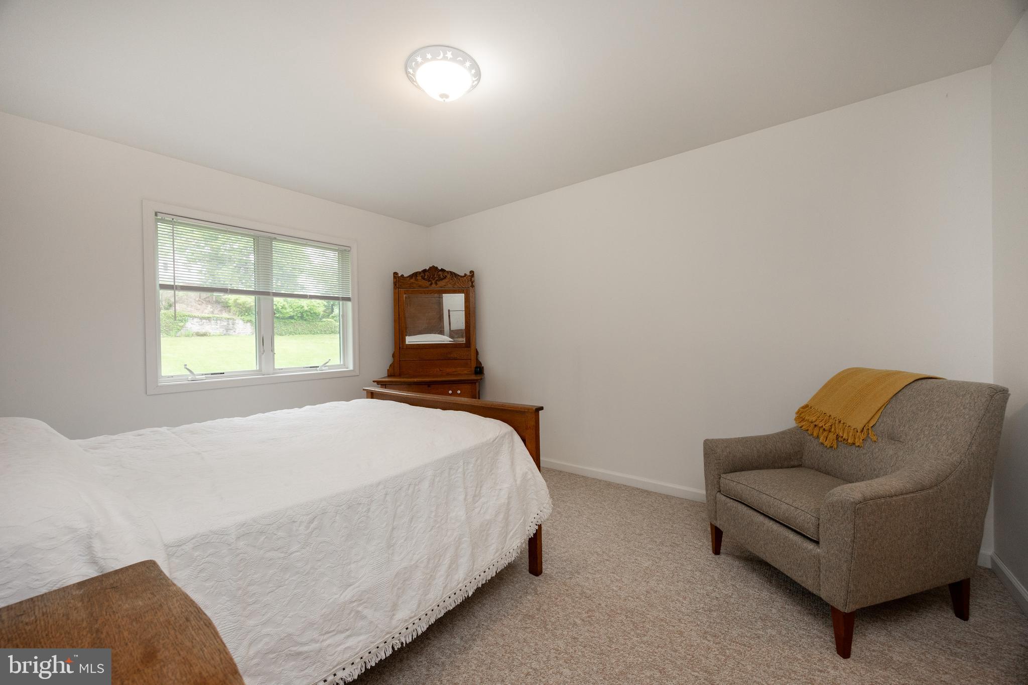 237 Poplar Street Spring City, PA 19475 - Photo 27 of 36 a bedroom with bed and window