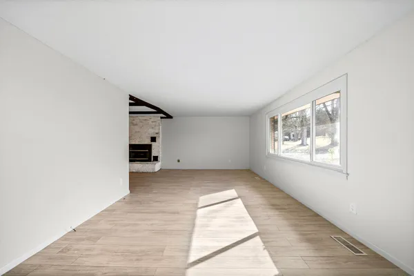 an empty room with windows