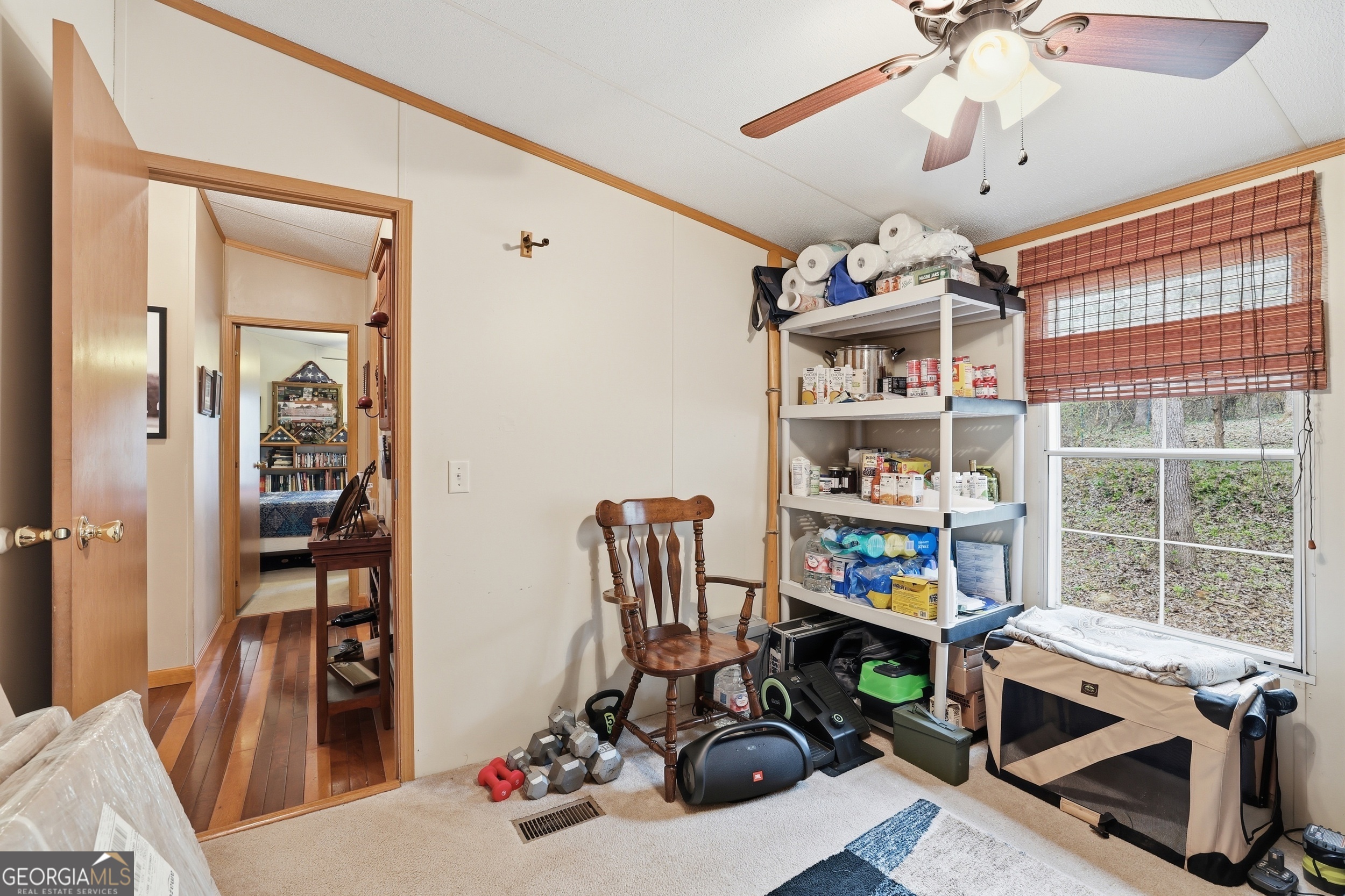 2533 McFarlin Bridge Road Carnesville, GA 30521 - Photo 23 of 37 a view of a workspace with furniture and a window