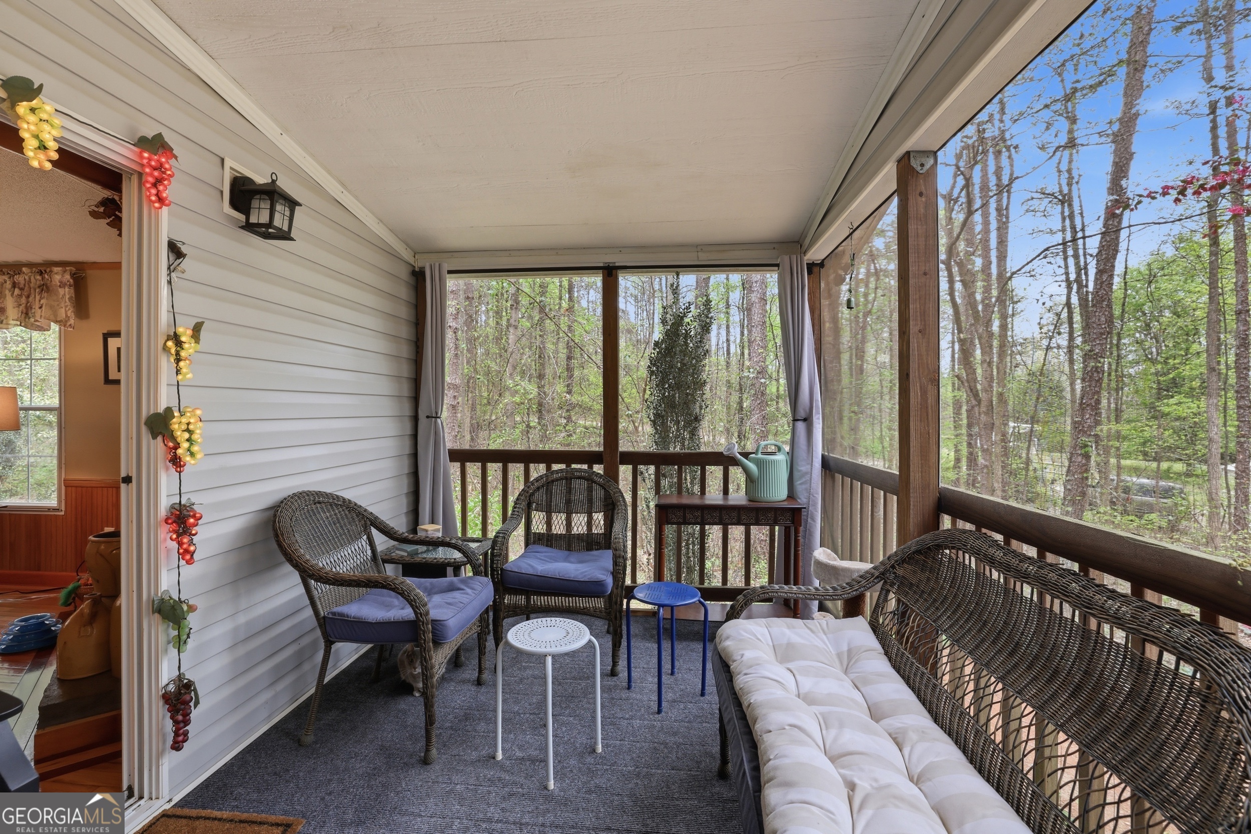2533 McFarlin Bridge Road Carnesville, GA 30521 - Photo 25 of 37 a balcony with table and chairs