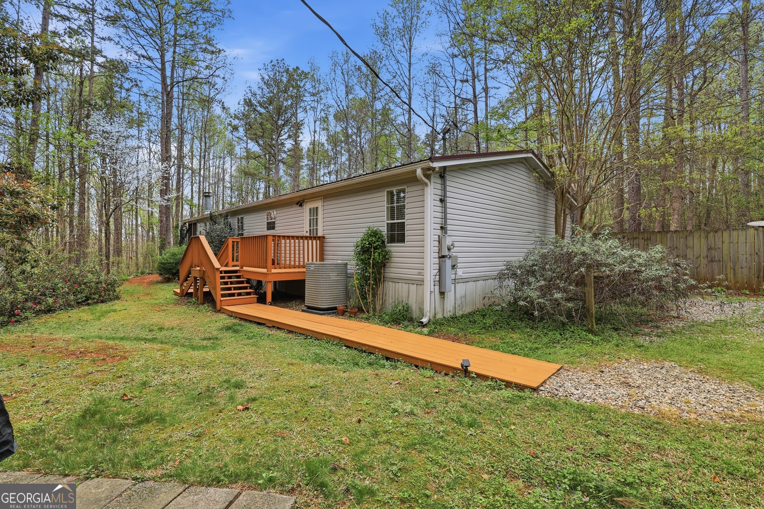 2533 McFarlin Bridge Road Carnesville, GA 30521 - Photo 28 of 37 a view of backyard with small cabin
