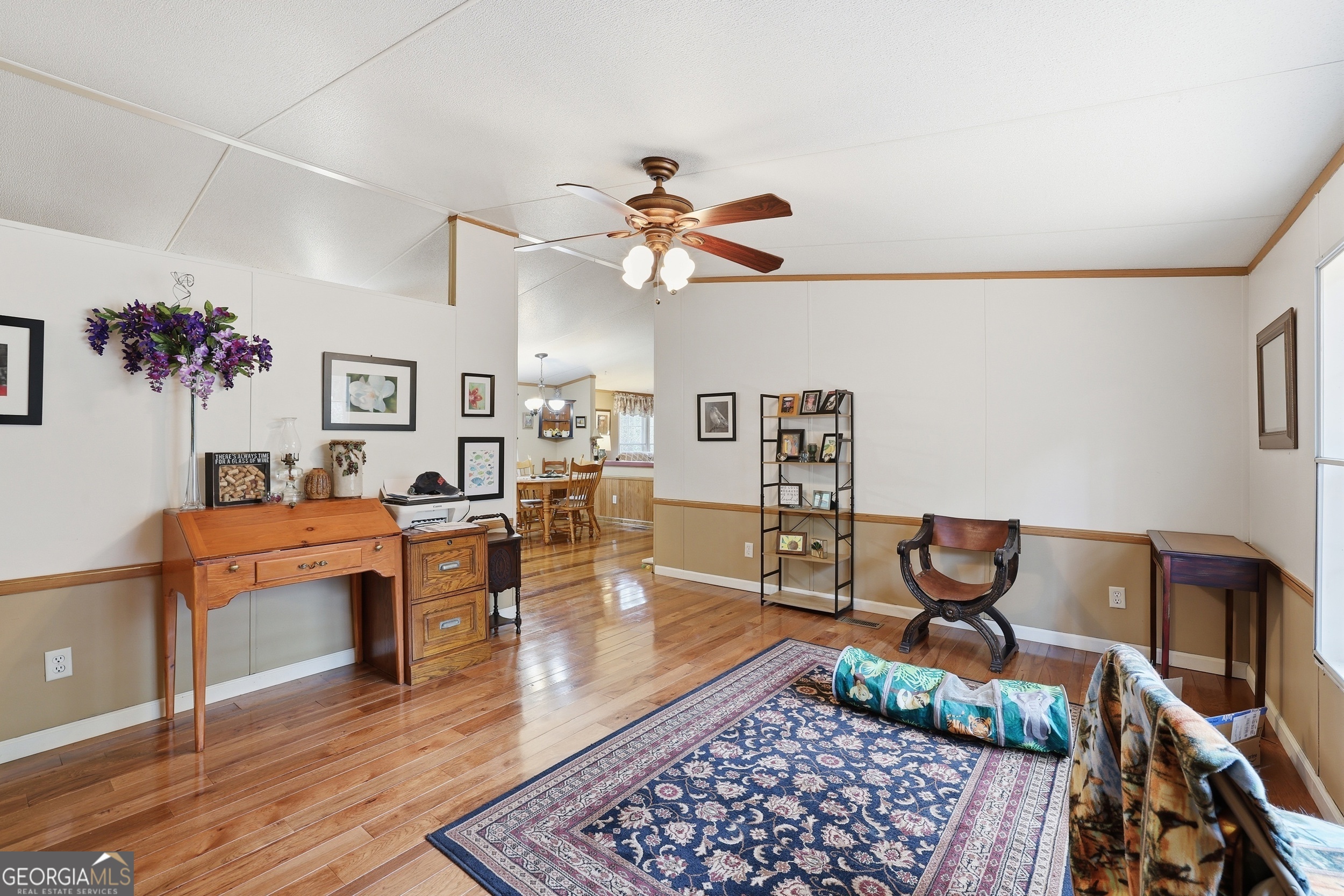 2533 McFarlin Bridge Road Carnesville, GA 30521 - Photo 4 of 37 a living room with furniture and a rug