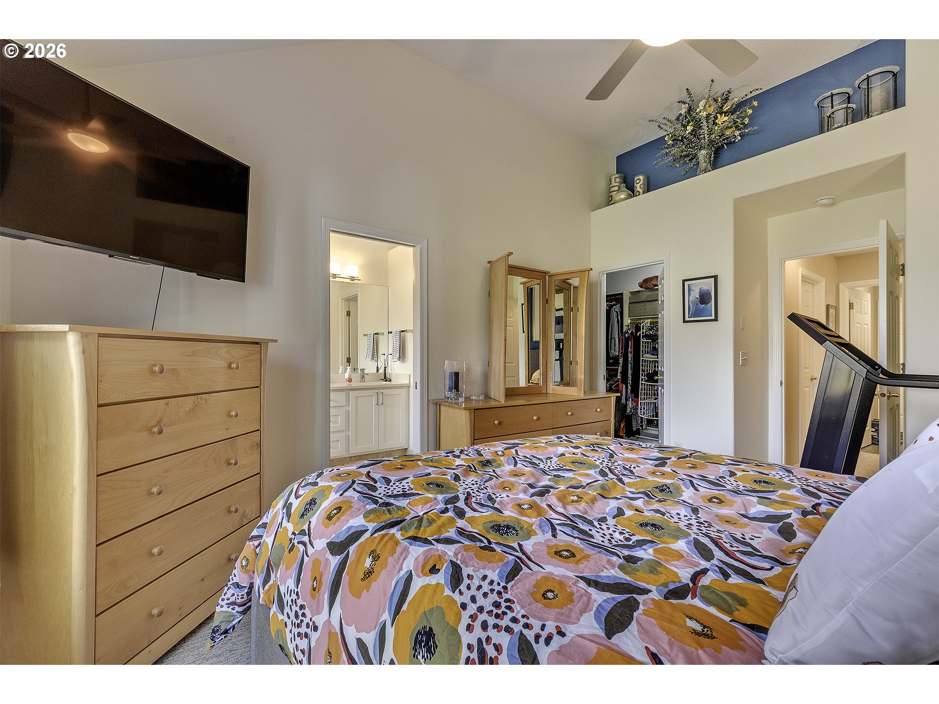 16761 Northwest Stoller Drive Portland, OR 97229 - Photo 13 of 35 a bedroom with a bed and a flat screen tv