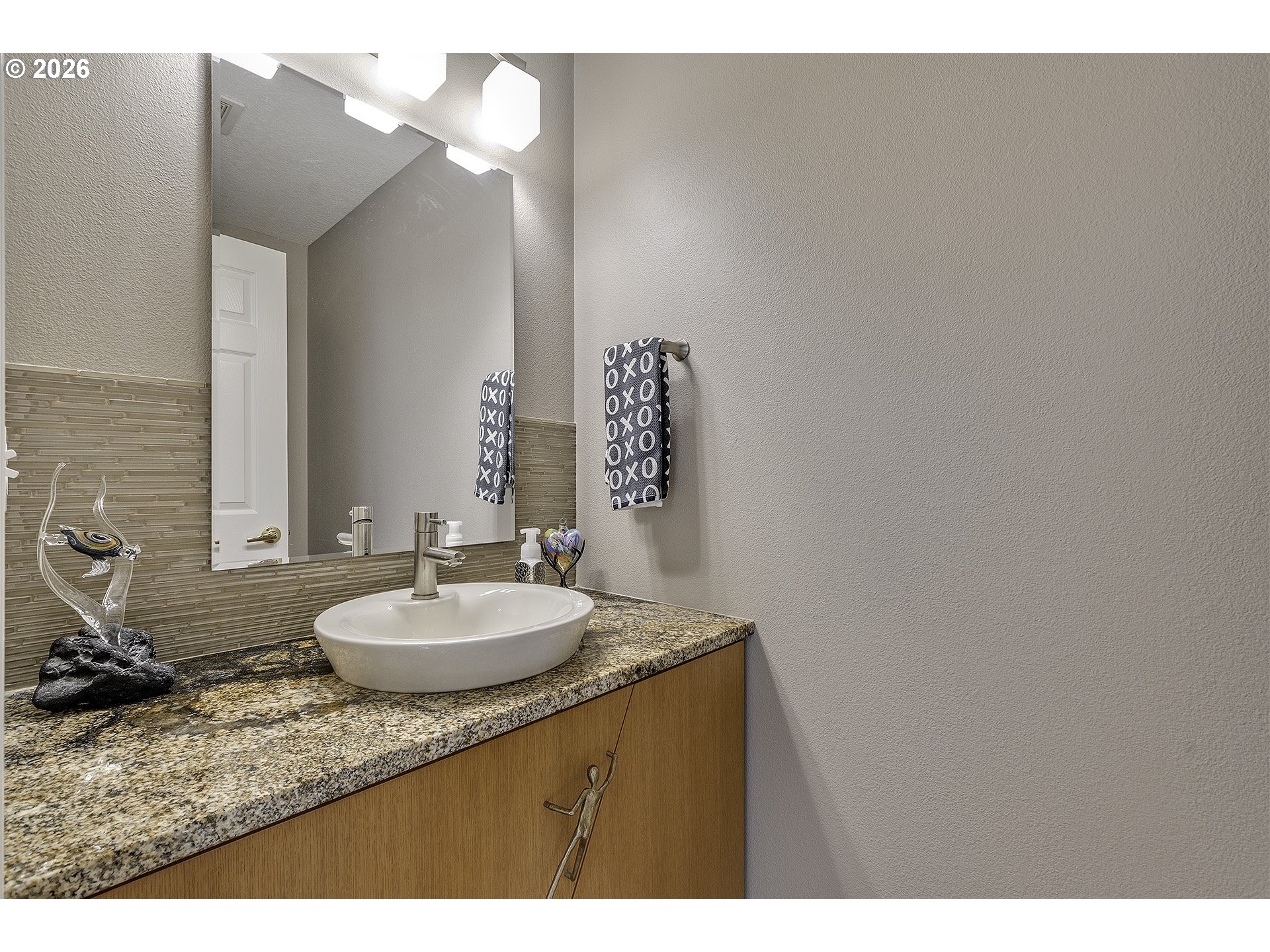 16761 Northwest Stoller Drive Portland, OR 97229 - Photo 17 of 35 a bathroom with a granite countertop sink and a mirror