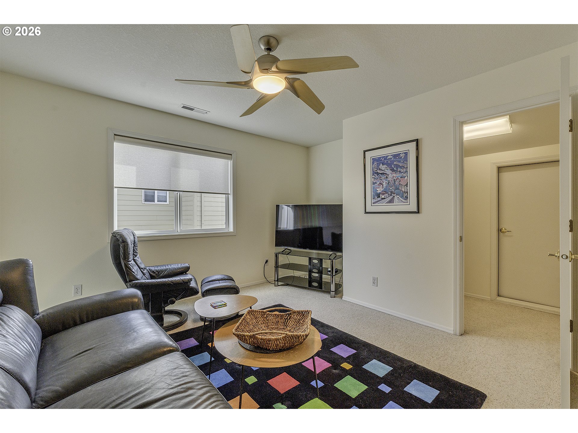 16761 Northwest Stoller Drive Portland, OR 97229 - Photo 20 of 35 a living room with furniture and a wooden floor