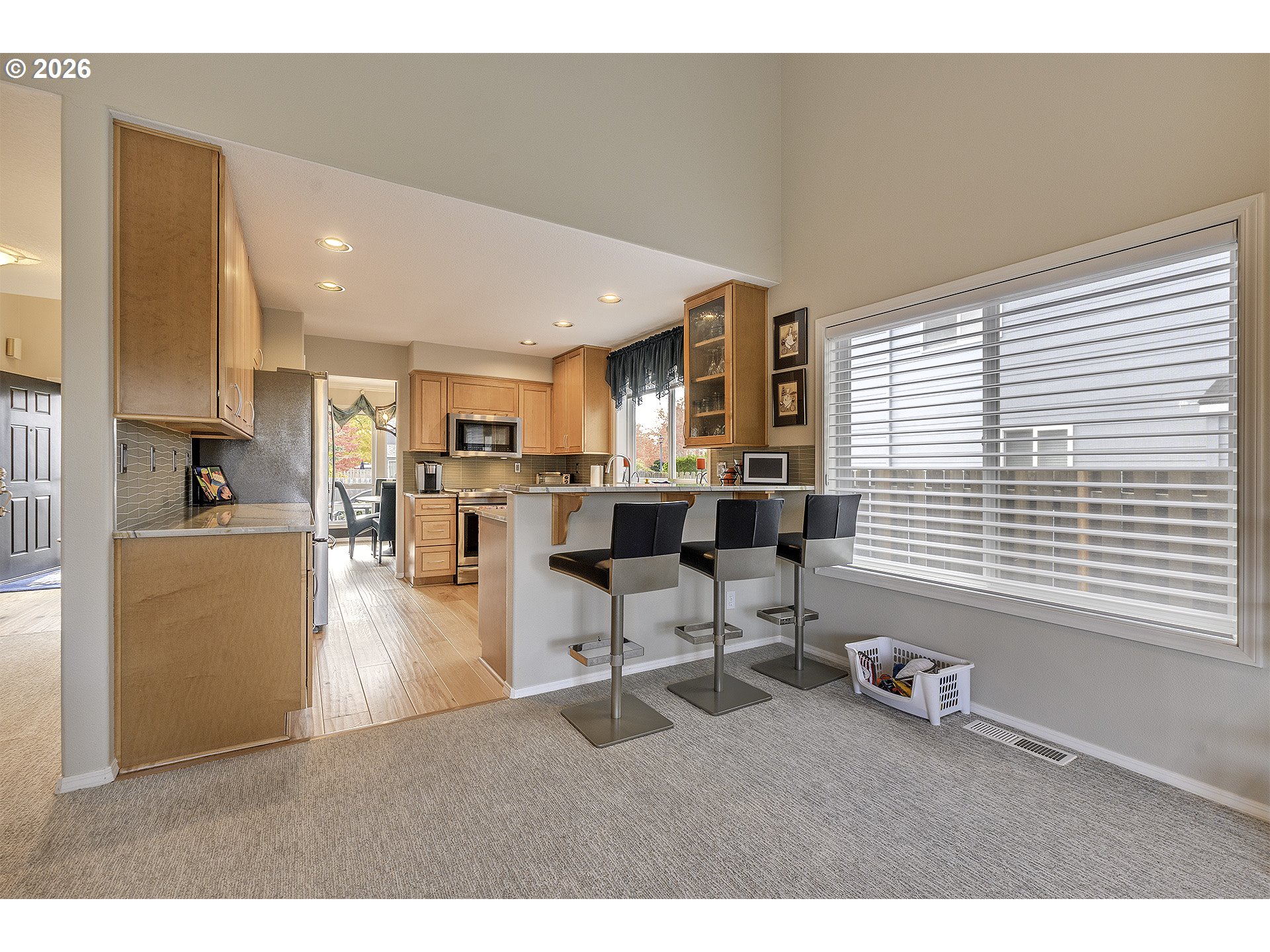 16761 Northwest Stoller Drive Portland, OR 97229 - Photo 28 of 35 a living room with furniture and kitchen view