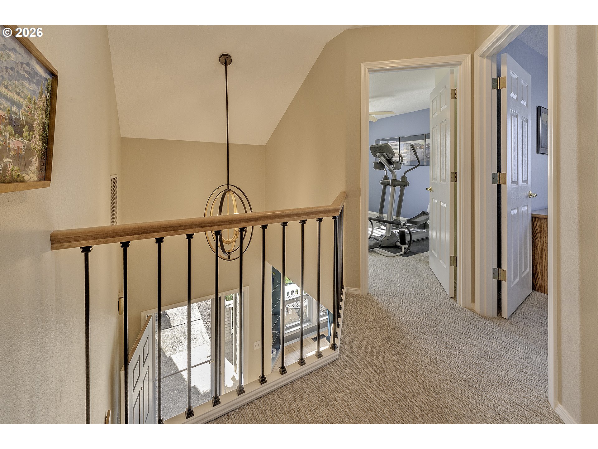 16761 Northwest Stoller Drive Portland, OR 97229 - Photo 30 of 35 a view of a hallway and a livingroom with furniture