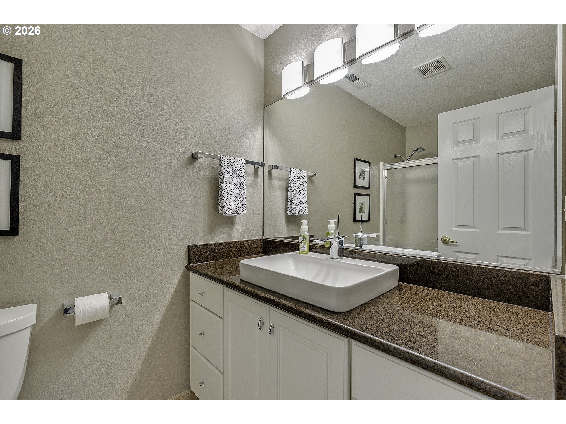 16761 Northwest Stoller Drive Portland, OR 97229 - Photo 32 of 35 a bathroom with a sink and a mirror