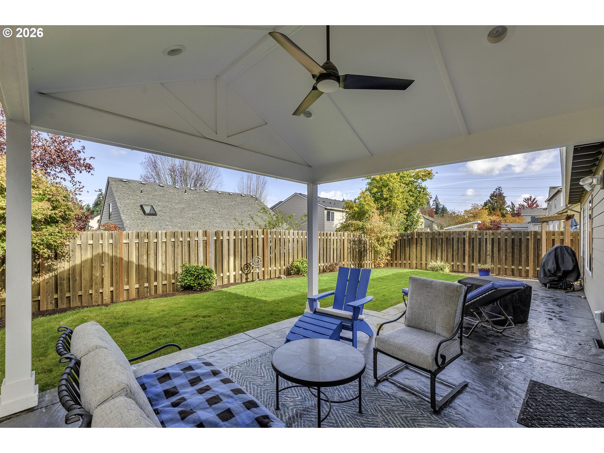 16761 Northwest Stoller Drive Portland, OR 97229 - Photo 33 of 35 a patio with yard table and chairs