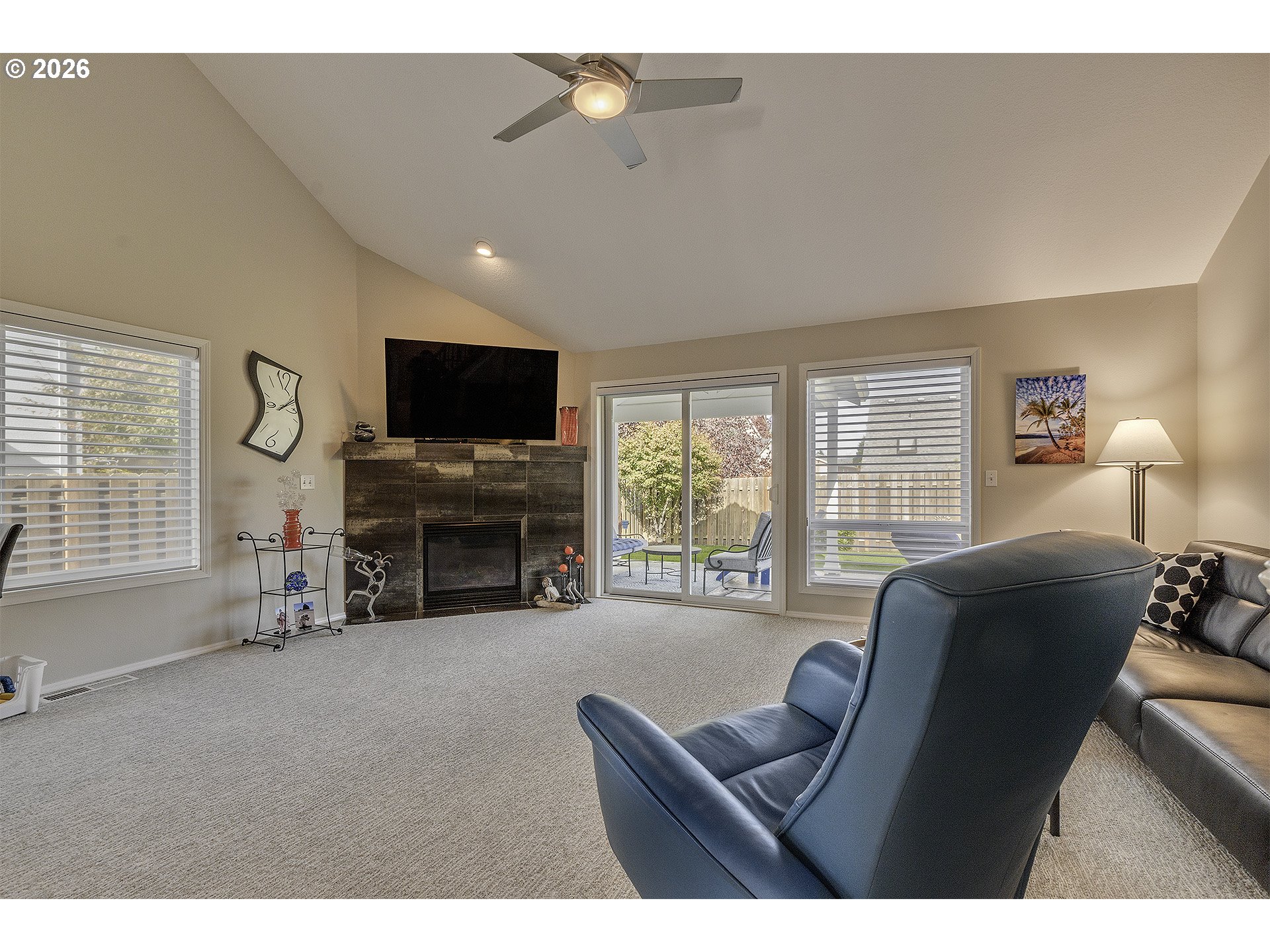 16761 Northwest Stoller Drive Portland, OR 97229 - Photo 4 of 35 a living room with furniture and a flat screen tv