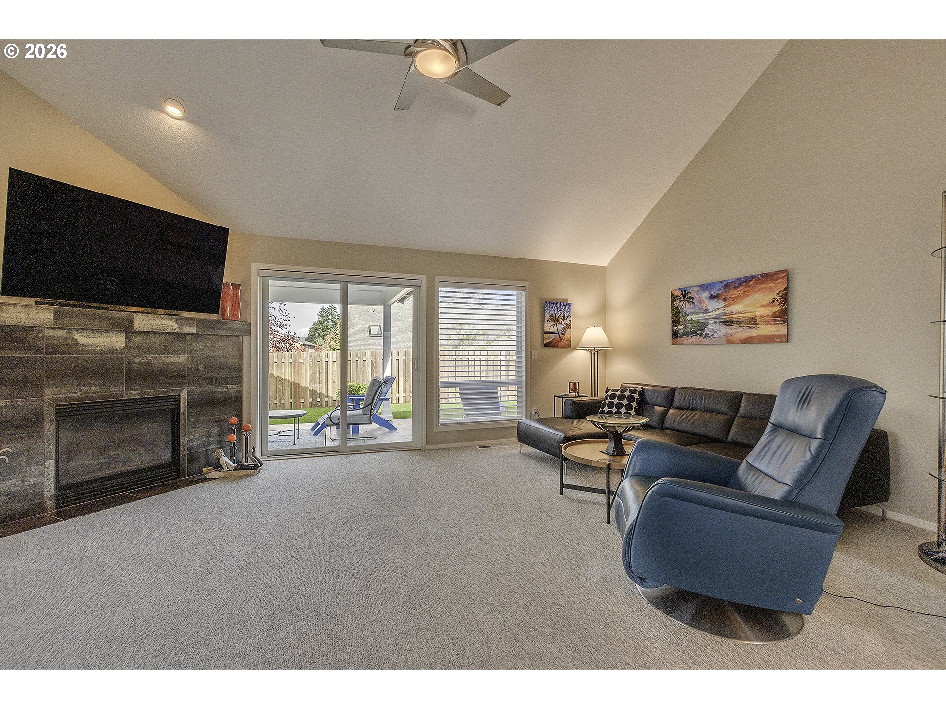 16761 Northwest Stoller Drive Portland, OR 97229 - Photo 5 of 35 a living room with furniture and a flat screen tv
