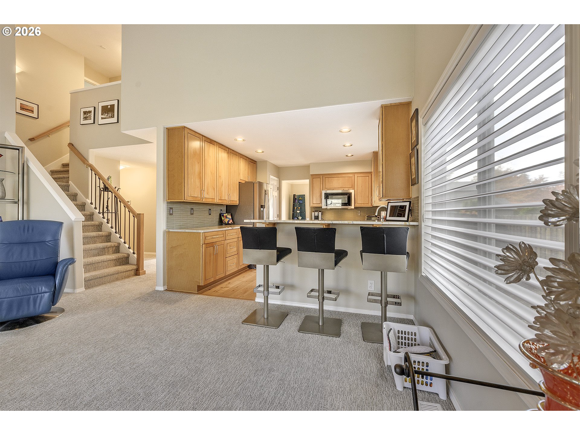 16761 Northwest Stoller Drive Portland, OR 97229 - Photo 7 of 35 a living room with furniture and kitchen view