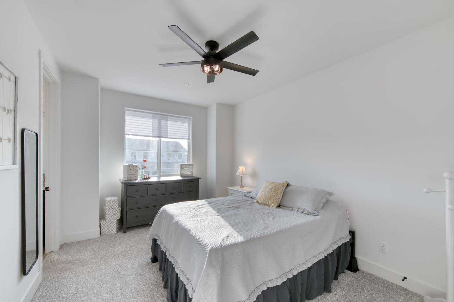 1736 North Renn Avenue Clovis, CA 93619 - Photo 31 of 66 a bedroom with a bed and a window