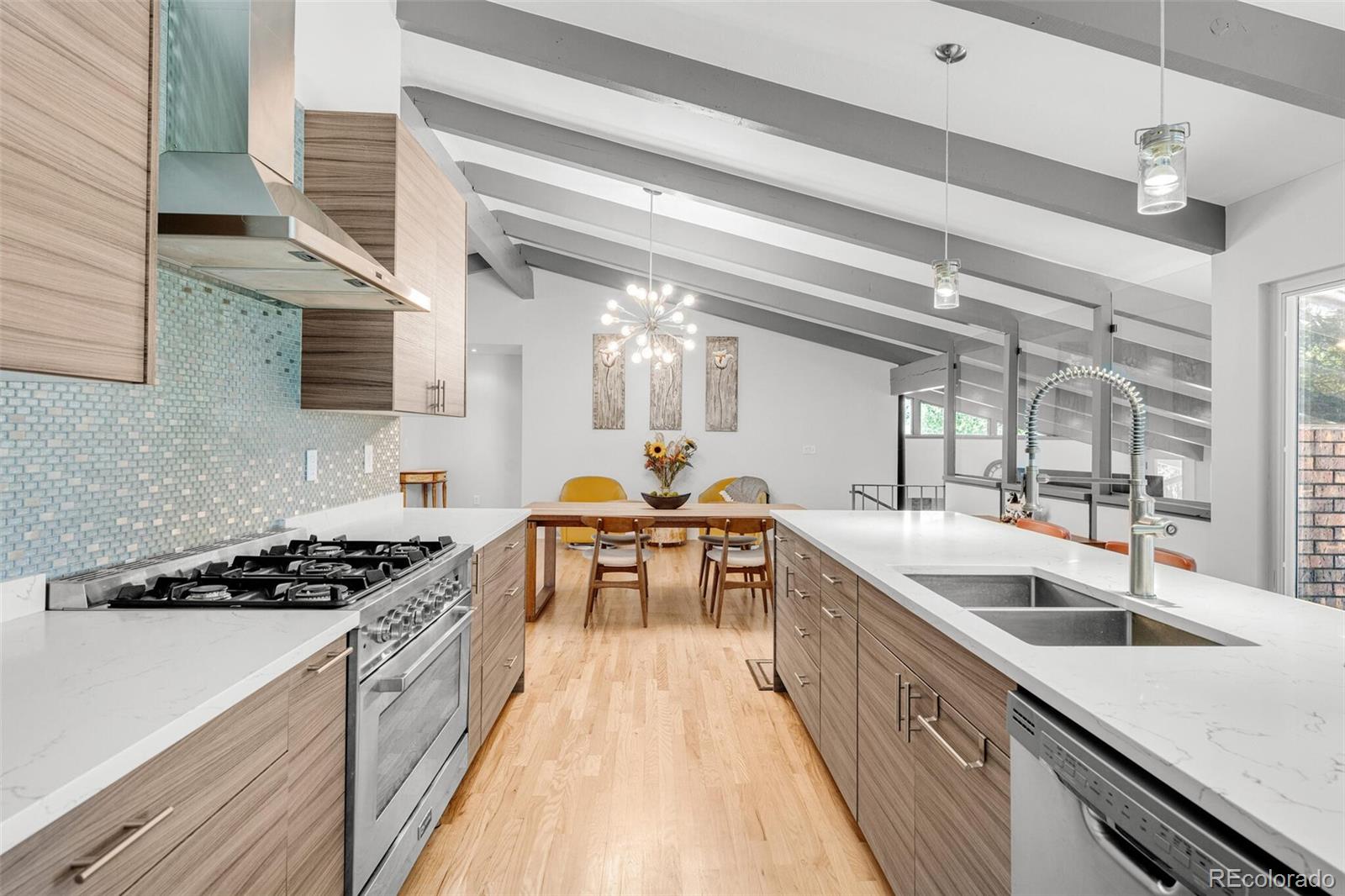 4595 West Lakeridge Road Denver, CO 80219 - Photo 14 of 45 a kitchen with a sink and appliances