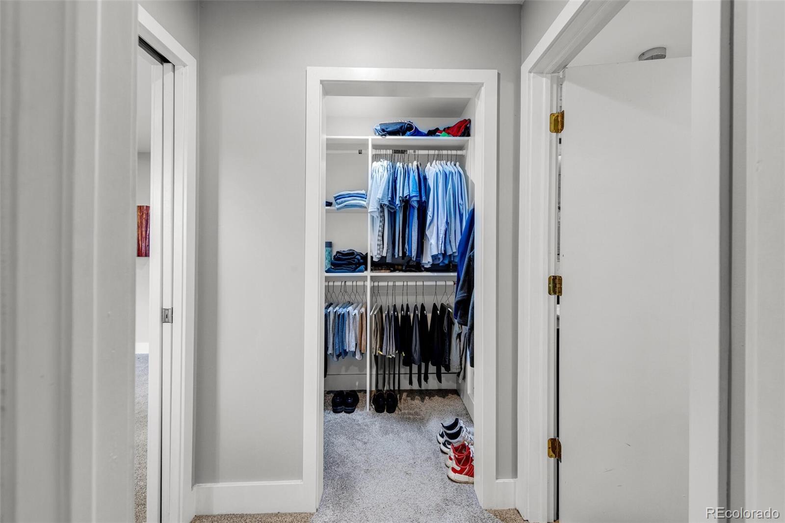 4595 West Lakeridge Road Denver, CO 80219 - Photo 24 of 45 a view of walk in closet with clothes