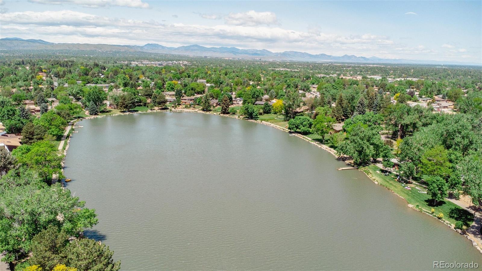 4595 West Lakeridge Road Denver, CO 80219 - Photo 43 of 45 a view of a lake with a city