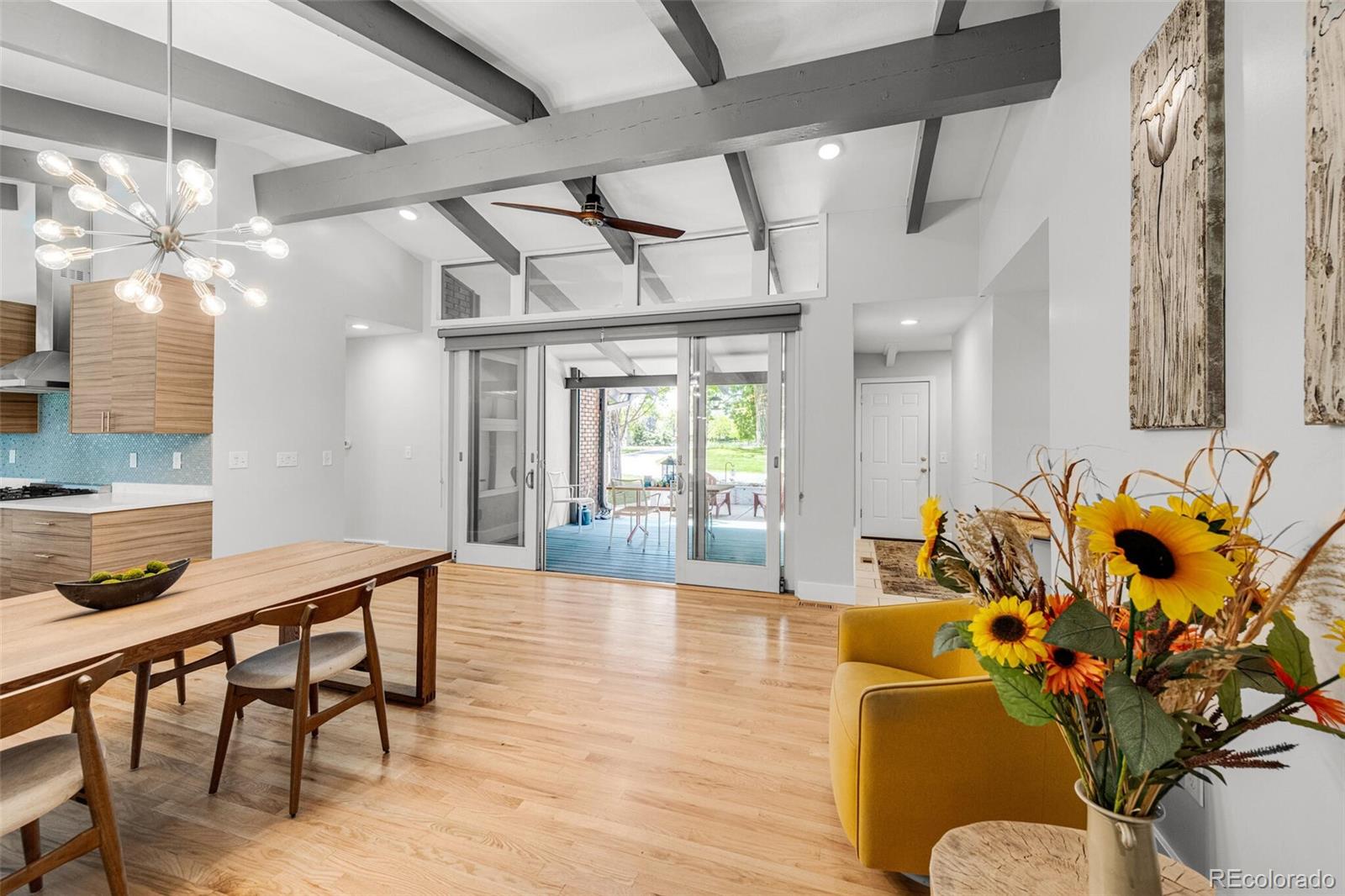 4595 West Lakeridge Road Denver, CO 80219 - Photo 5 of 45 a lobby with furniture and wooden floor