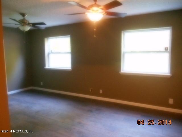10633 Rutgers Road Jacksonville, FL 32218 - Photo 9 of 11 a view of room with window