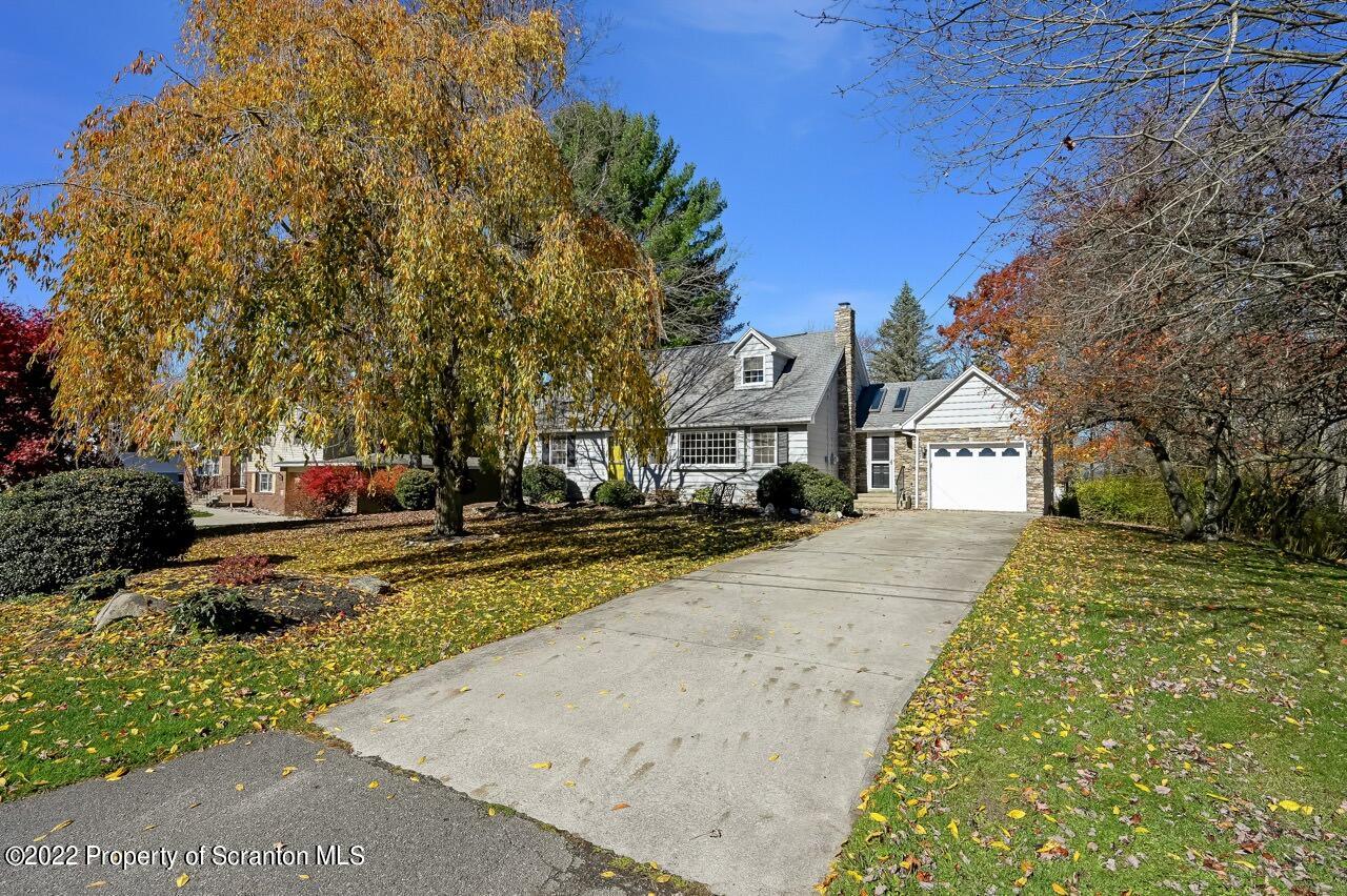 104 Fern Lane Moscow, PA 18444 - Photo 1 of 44 a front view of a house with a yard