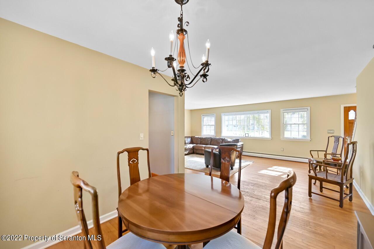 104 Fern Lane Moscow, PA 18444 - Photo 13 of 44 a view of a dining room with furniture and window