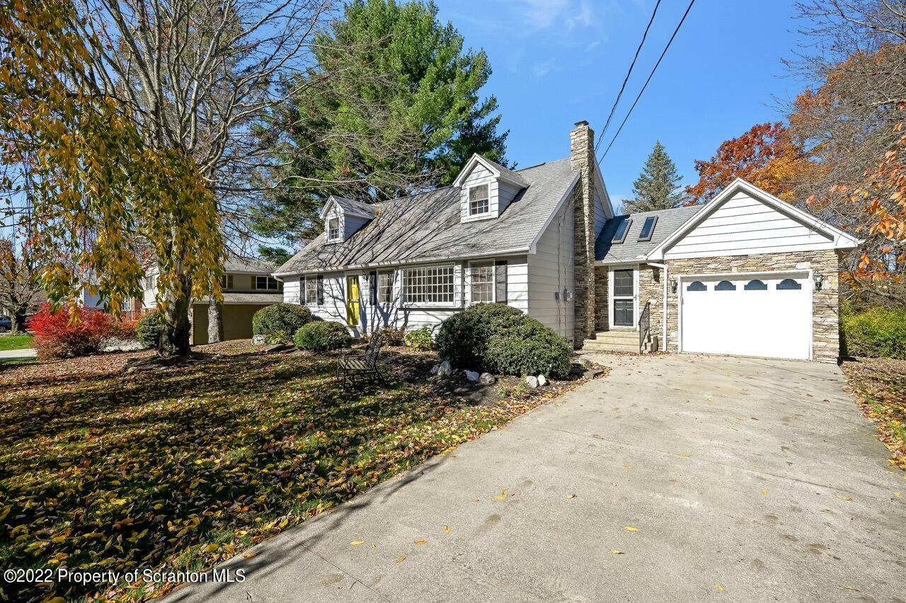 104 Fern Lane Moscow, PA 18444 - Photo 2 of 44 a front view of a house with a yard