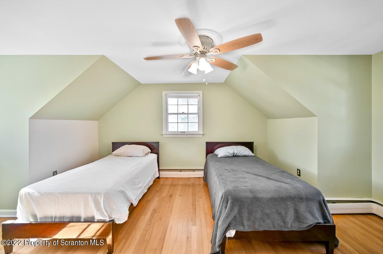 104 Fern Lane Moscow, PA 18444 - Photo 33 of 44 a bedroom with a bed and window