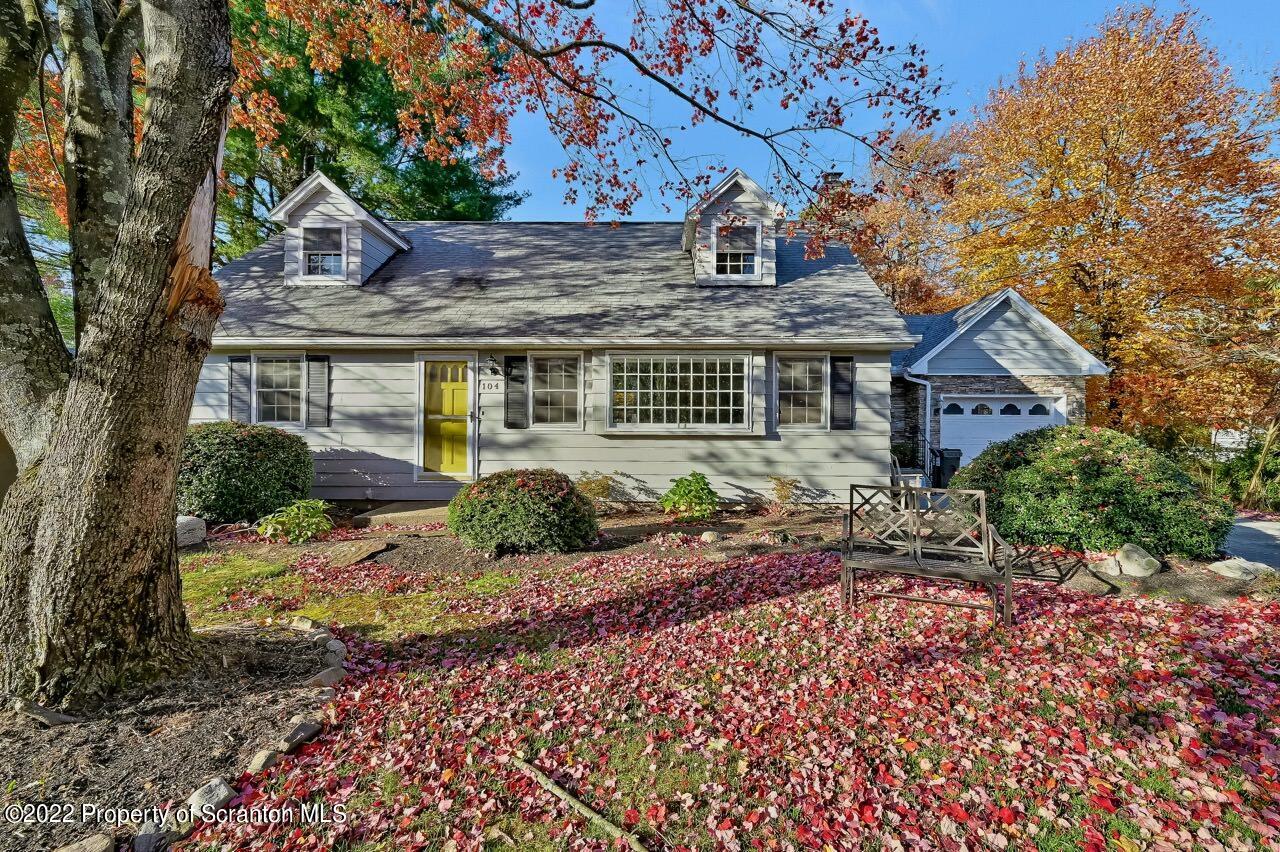 104 Fern Lane Moscow, PA 18444 - Photo 39 of 44 a front view of a house with a garden