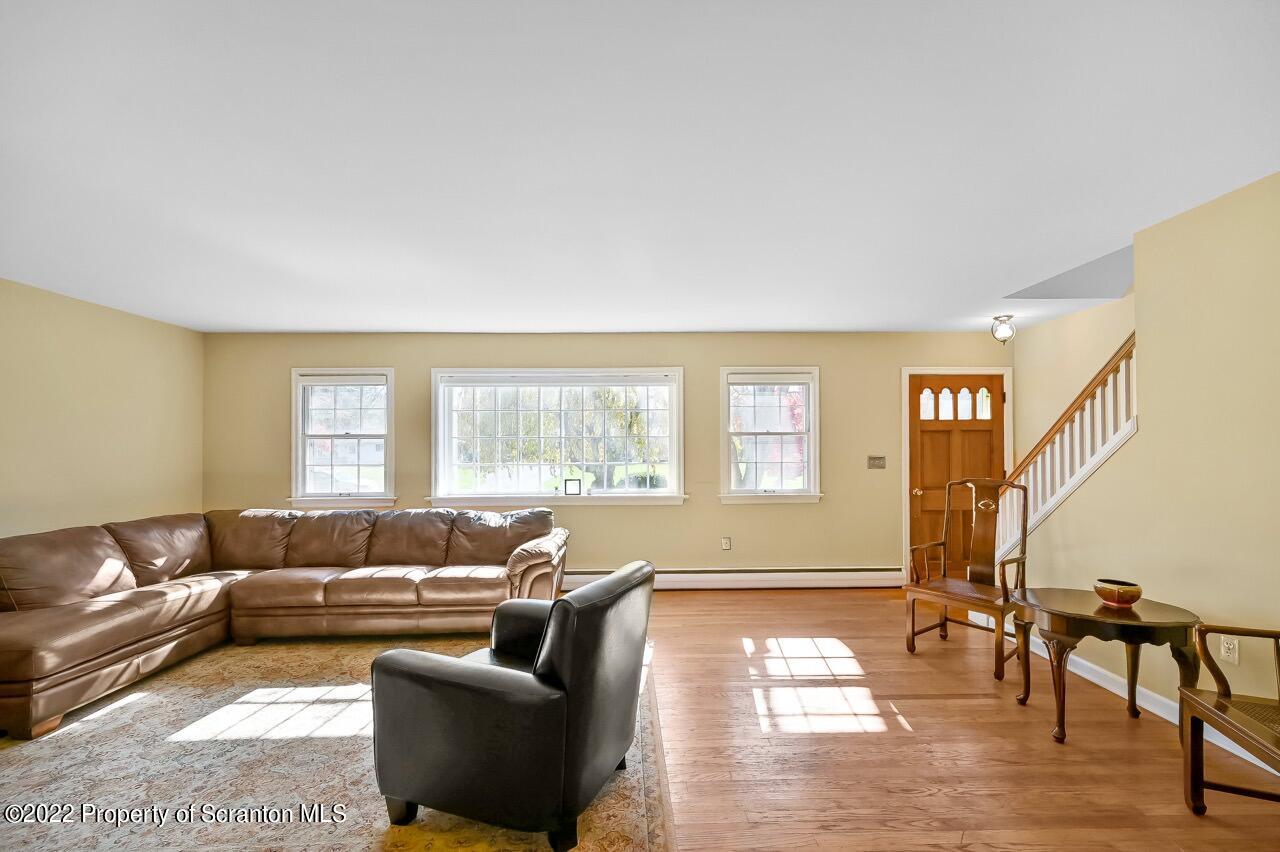104 Fern Lane Moscow, PA 18444 - Photo 4 of 44 a living room with furniture and a window